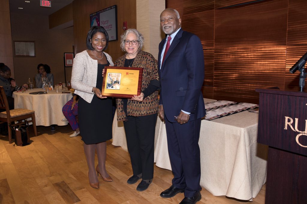 Marcy Schwartz (center), from the School of Arts and Sciences, was one of two recipients of the 2023 Clement A. Price Human Dignity Award. She is pictured with Anna Branch (left), senior vice president for equity and Ron Quincy (right), a member of the Committee to Advance Our Common Purposes.