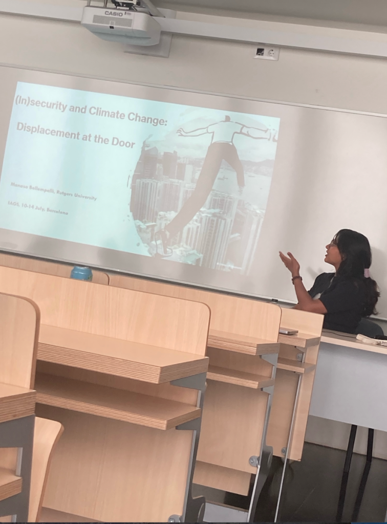 Photo: Manasa Bollempalli presents at the 16th Biennial Meeting of the International Association of Genocide Scholars (IAGS), 10-14 July 2023, Barcelona, Spain
