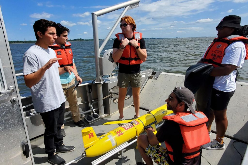 A summer internship at Rutgers a decade ago introduced Joe Gradone (left) to underwater gliders.