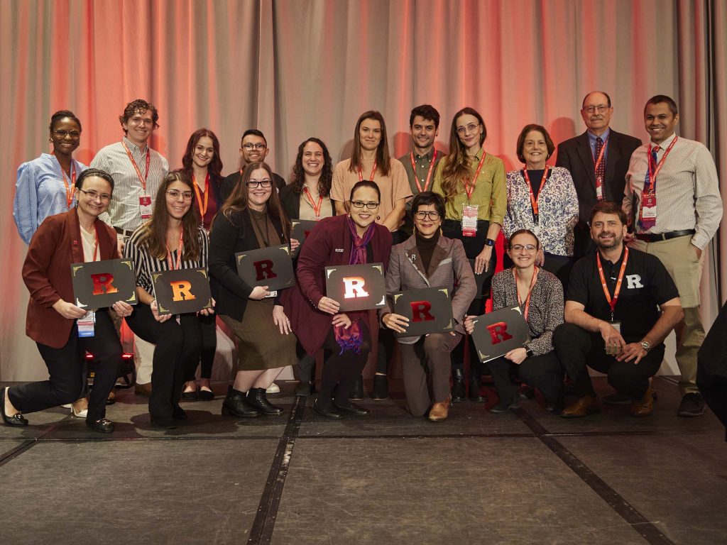 Conference organizers display their certificates of appreciation alongside the conference chair, Onur Bilgen. Top row L-R: Kelsie Riche, Michael LoCascio, Waylen Glass, Greg Methon, Aliza Abraham, Ulrike Egerer, Michael Sinner, Emina Maric, Peggy Brennan-Tonetta, Paul Veers, Tony Martinez. Bottom row L-R: Amy Mandelbaum, Samantha Alaimo, Rubia Serra, Sheila Borges Rajguru, Denise Hien, Gen Starke, Onur Bilgen.