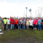 PECES team and volunteers after the delivery of supplies. Photo courtesy of PECES, inc. via Facebook.